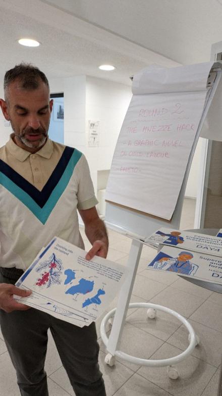 Fausto Saltetti of ITCILO presenting pages from a graphic novel as a learning tool to spark discussion on child labour.