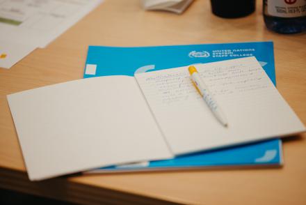 UNSSC branded notebook and pen