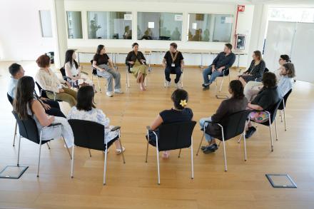 JPOs sitting in a circle during a training session