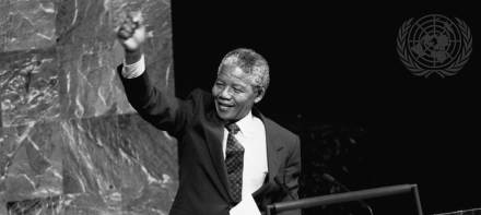 Nelson Mandela raises his fist while addressing the Special Committee Against Apartheid in the General Assembly Hall