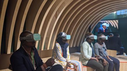 People looking through VR devices