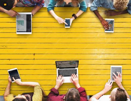 people engaging in online learning on different devices