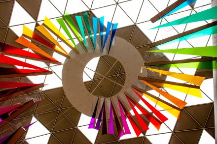 Installation with colours that remind of the SDG wheel