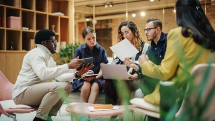 diverse group of people discussing 