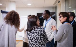 Diverse group of people engaged in a learning activity