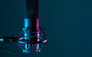 A close up photo of a podcast microphone 