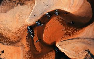 Aerial view of a riverbed with small boats