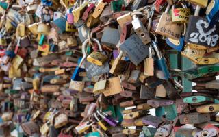 Assorted locks on a bridge