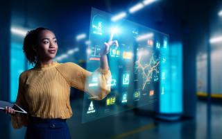 A person touching a transparent screen  AI-generated content may be incorrect.