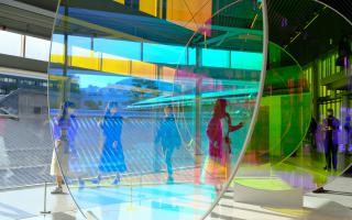 Hall with glass installations that reflect light in different colours