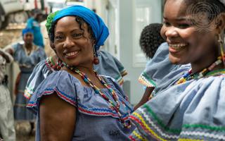 Two women participate in an International Women's Day event organized by the United Nations Stabilization Mission in Haiti (MINUSTAH) at the Haitan Police Academy.