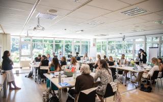 Emerging leadership programme participants in classroom during training session