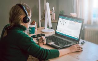 person engaged in online learning